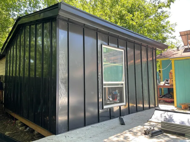 Black standing seam metal wall panels for Metal Roof Installation in Carrollton